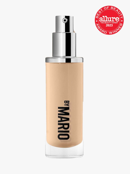Makeup by Mario SurrealSkin Foundation bottle of foundation with silver pump cap on light gray background with red Allure Best of Beauty seal in the top right corner
